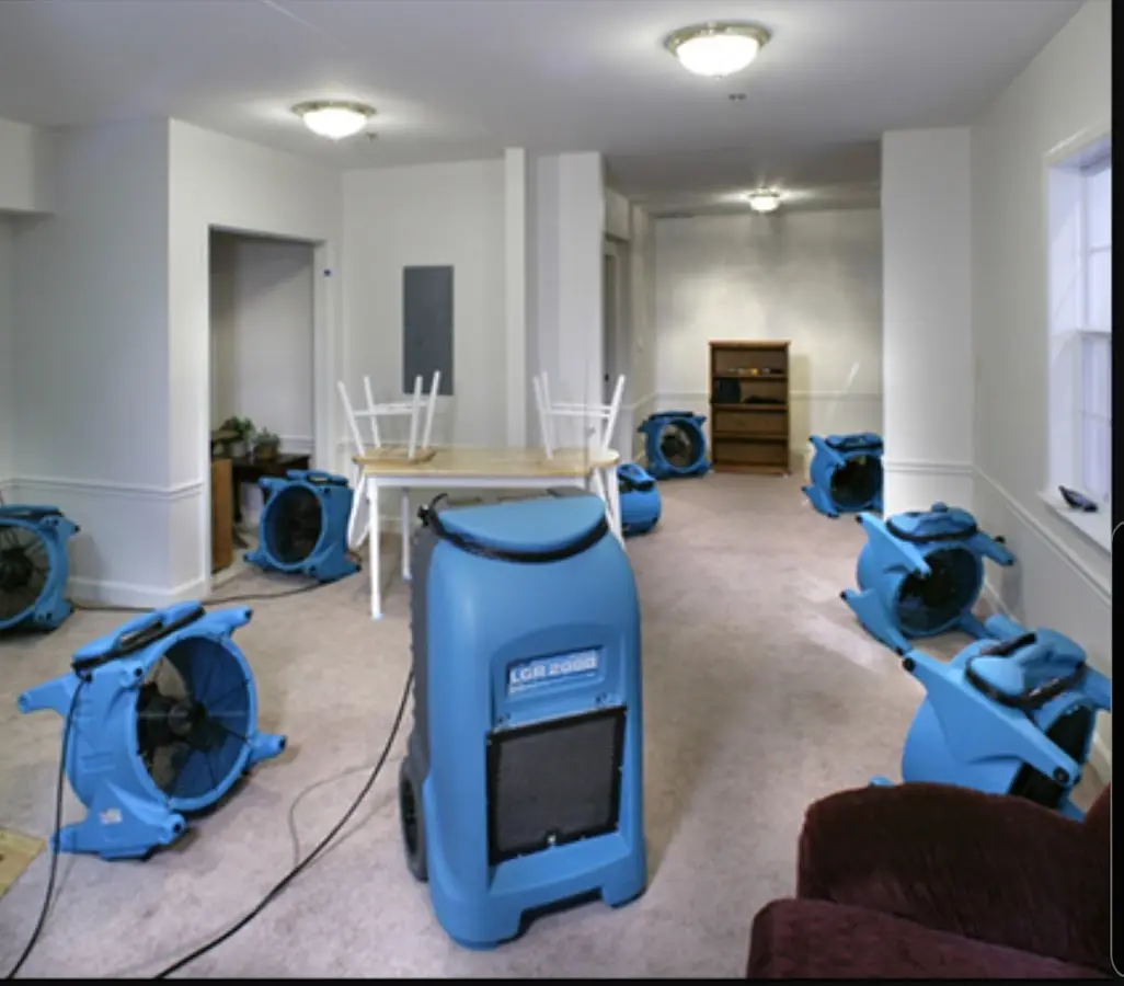Air movers and dehumidifier setup for Water Damage Restoration in Inwood